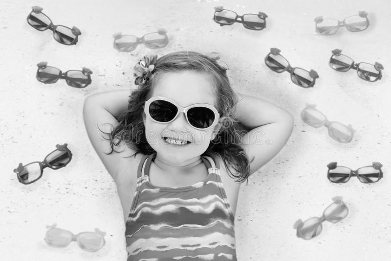 Choosing Baby Girl With Sunglasses photo 2